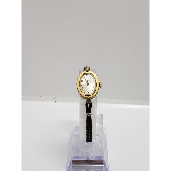 Small women\'s Timex watch. Light gold face. Black double rope band. main image 8
